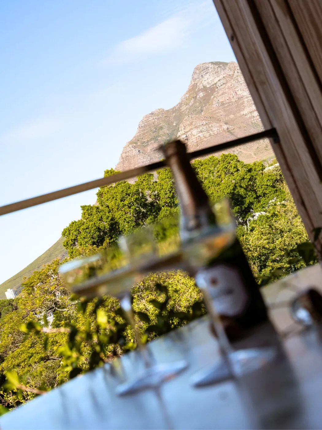 Wine on the balcony, Lion's Head beyond